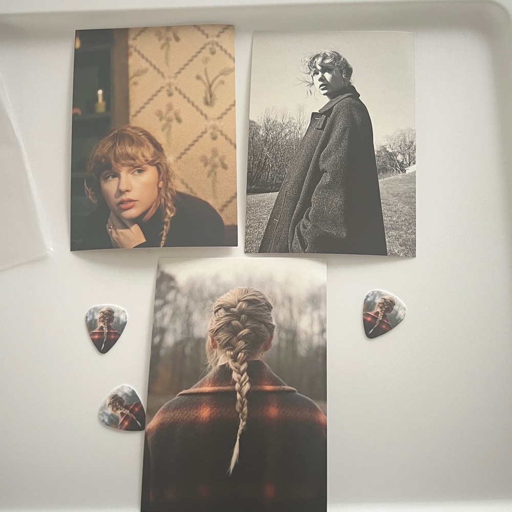 Taylor Swift evermore guitar picks and postcard